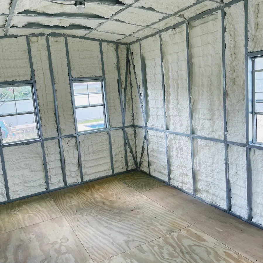 Closed-cell spray foam insulation applied to wall cavities in a residential project in Kaiminani